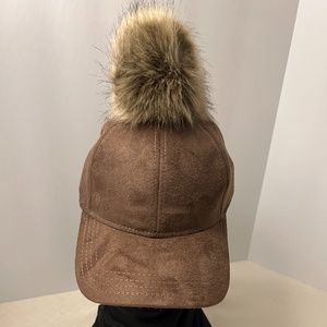 new brown suede cap with fur ball on top
